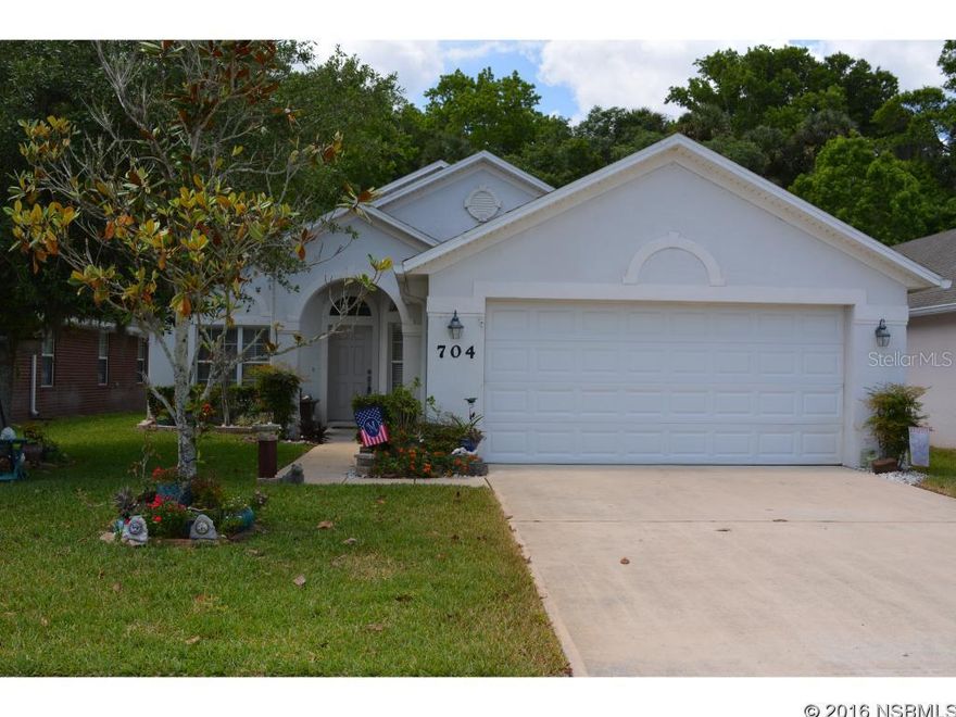 Live the Florida Lifestyle in beautiful, gated, Coral Trace.  This block home, built in 2006 has been lovingly updated with gorgeous new wood floors in the master bedroom.  Custom closet systems have been installed in the master closets. A lovely fenced backyard to enjoy your peaceful conservation view.  There is a screened, covered lanai as well as an open slab for your grill and fire pit.  For added peace of mind, there are hurricane shutters for all windows that have never been used (knock on wood.) Coral Trace amenities include lawn care, a community pool and clubhouse, with a fitness area and meeting room and conveniently located a short drive from I-95 and just minutes to the beaches and surf of New Smyrna Beach. ;Water: City