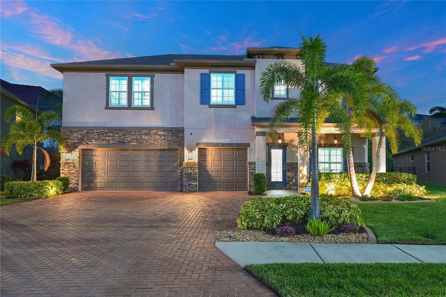 Buyers take note! This listing focuses on a rare find in the Oakleaf Hammock community. If you’re looking for a primary residence that offers more than just a roof over your head, take out your notebooks and look at this beautiful, FL home.
This isn't your standard suburban tract home. We’re looking at a two-story, three-car garage estate where the "luxurious updates" actually live up to the hype. Forget the fluff—here are the facts: The first floor features hardwood flooring, gorgeous woodwork, and quartz counters. You’ll notice the craftsmanship in the staggered bright kitchen cabinetry and the tray ceiling in the living room, which uses beams that match the flooring for visual symmetry.  Step outside to your own private oasis where your new backyard features a private saltwater heated pool and spa designed for recreation and hosting. The details continue on with High-end finishes like plantation shutters, crown molding, and a paver driveway - they all can be found here. The Oakleaf Hammock neighborhood serves as a sanctuary, preserving Florida’s natural charm. With over 20 lakes and ponds and a canopy of mature oak trees, it’s like living in a Florida preserve.  Low HOA fees come with a basketball court, multipurpose sports field, and pet-friendly walking trails right on-site.  Here's one for the fiscally conservative —there are no CDD fees, and the quarterly HOA remains low because the community focuses on natural preservation rather than high-maintenance clubhouses.
Location is the most critical variable in Oakleaf Hammock living. This property sits near the I-75 corridor, placing you halfway between the cultural hubs of Sarasota/Bradenton or St Pete/Brandon/Tampa and the crystal-sand beaches of Anna Maria Island. Plus, You’re minutes from Ellenton Premium Outlets and Parkwood Square anchored by Publix and ever expanding shopping and culinary treasures.  Family Excursions include Exploring the Gamble Plantation Historic State Park or take a free skate or join a Hockey Team at the Ellenton Ice and Sports Complex, your lifestyle choices couldn't be better - all you just need to do is make the choice to call this house your home!