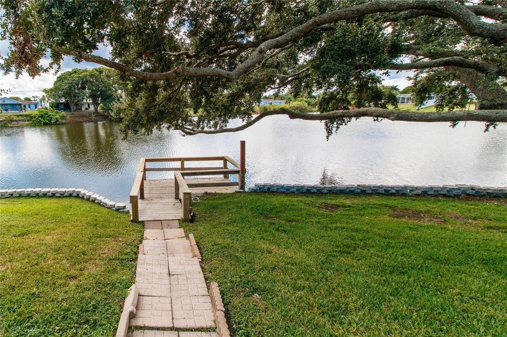 Photo of 9400 Lake Christina Lane, Port Richey, FL 34668 (MLS # W7879323)