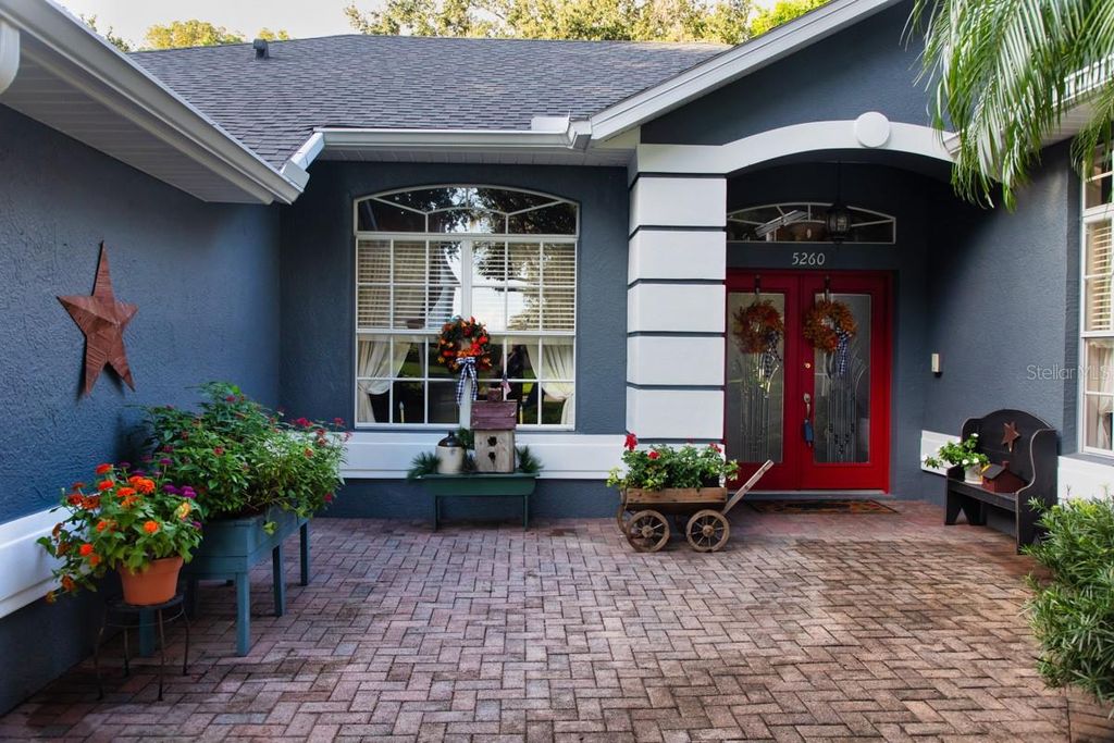 Photo of 5260 Hammock Circle, Saint Cloud, FL 34771 (MLS # TB8428256)