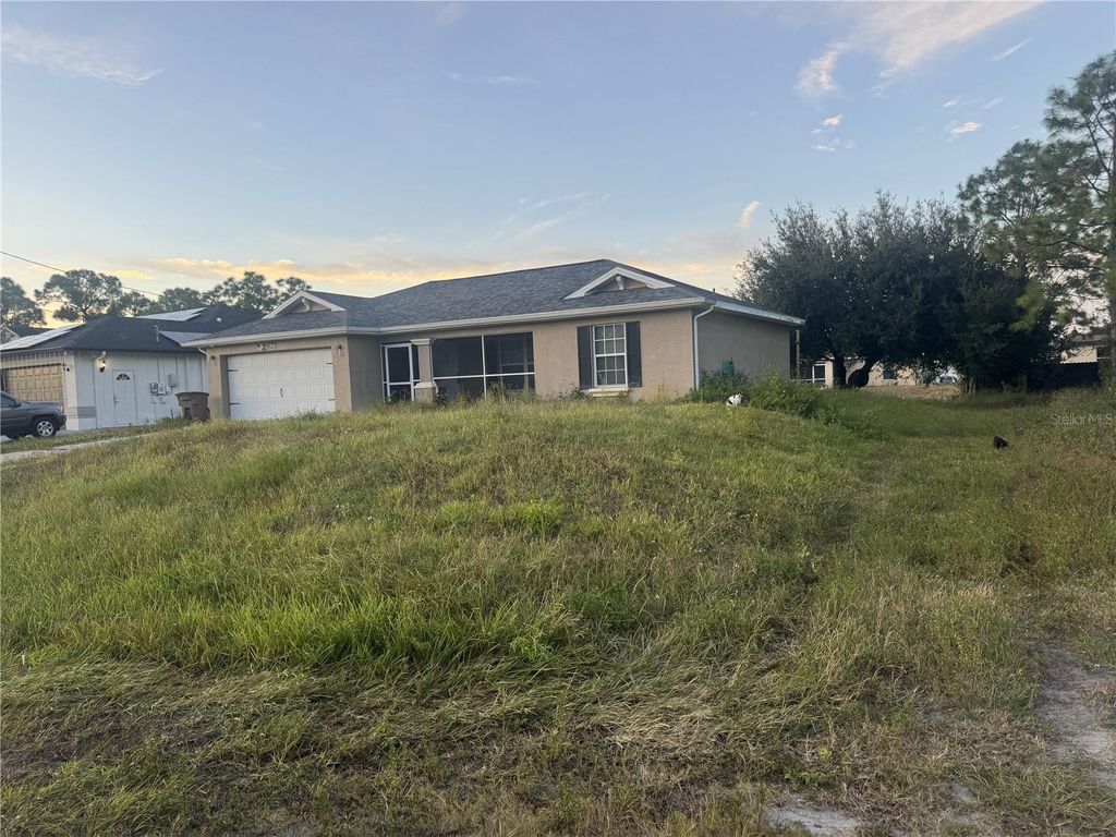 Photo of 3506 38th Street SW, Lehigh Acres, FL 33976 (MLS # A4671972)