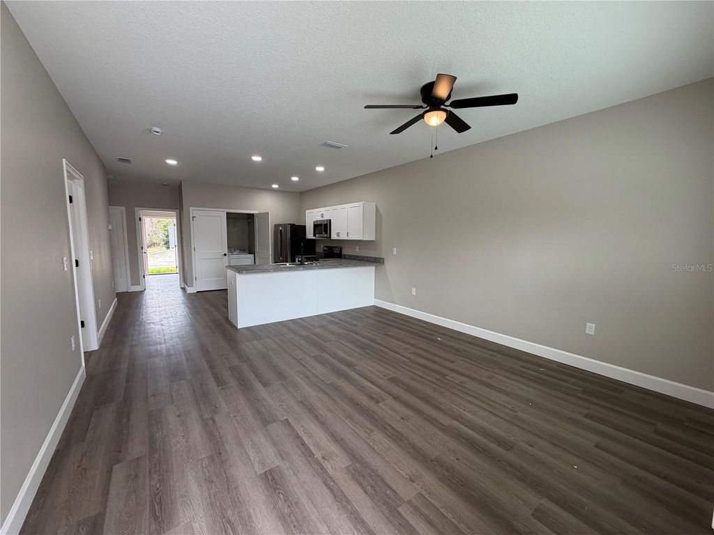 Photo of 1418 SE Magnolia Loop #104, Lake City, FL 32025 (MLS # O6385708)