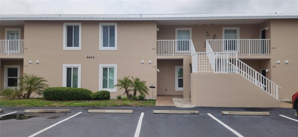 Photo of 9600 Fiddlers Green Circle #110, Rotonda West, FL 33947 (MLS # D6148244)