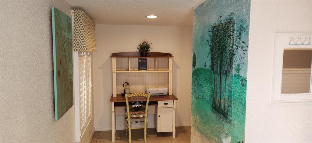 Photo of 9600 Fiddlers Green Circle #110, Rotonda West, FL 33947 (MLS # D6148244)