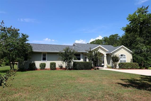 Escape the Ordinary — Luxury Living on 4.67 Cleared Acres! Step into your own private haven, where spacious design meets refined comfort. Set on 4.67 acres of cleared, versatile land, this 3000+ sq ft residence delivers exceptional living and entertaining opportunities—inside and out. Custom Theater Room with plush tiered seating for 9 guests—your personal movie palace. Enjoy this Oversized Great Room featuring a gas fireplace, elegant lighting, and room for your grand piano and more! Chef’s Kitchen Features: Gleaming granite countertops and gas range top, Double wall ovens for seamless cooking and hosting. The Bar seating areas and a spacious pantry for form and function open to the spacious Formal Dining Room that also boasts an electric fireplace perfect for memorable evenings. The Gracious Living Spaces also include Three full bedrooms, each with cozy carpeted flooring, Two full bathrooms offering style and space. Stylish Finishes are Durable and elegant ceramic tile and plank flooring throughout, Thoughtfully designed layout ideal for relaxation or entertaining! Outside Potential offers Expansive, cleared acreage with a pond ready for your vision—add a guest home, stables, gardens, pool or garages! Room to roam, play, and grow—land with unlimited flexibility Conveniently Located, Peaceful yet accessible, with easy access to town, Close to shopping, dining, and recreational activities and beached! This is more than a home—it's a lifestyle estate built for comfort, creativity, and connection. Contact us today to schedule a private showing and discover the possibilities that await!