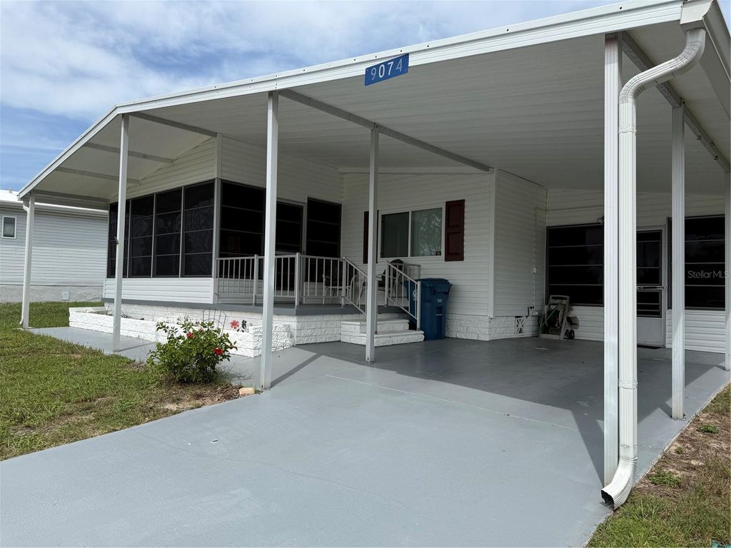 Photo of 9074 Highpoint Boulevard, Brooksville, FL 34613 (MLS # TB8423441)