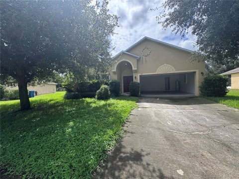 Photo of 1013 Evans Loop, Lake Wales, FL 33853 (MLS # L4965231)