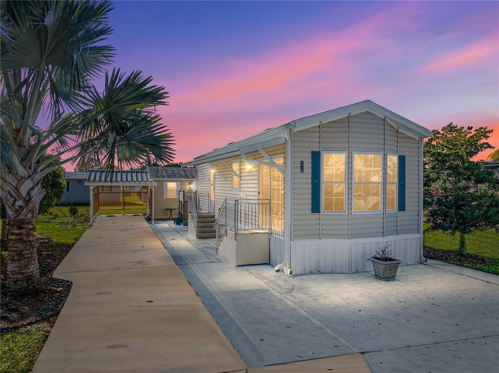 Welcome to your perfect new home—a stunning 2019 Model Year Manufactured Home in the desirable Mount Olive Shores community. This exceptional property features lush landscaping, a finished shed with a full bath, and an attached carport for your convenience. All major appliances, ceiling fans, and elegant window treatments are included, ensuring a comfortable living experience.
The spacious concrete pad is designed to accommodate motorhomes of any size and is equipped with all essential public utility hookups. Additionally, the annual HOA fee covers basic lawn maintenance and the upkeep of common areas, allowing you to enjoy a worry-free lifestyle.
Mount Olive Shores is more than just a home; it’s a vibrant, secure gated community just 3.5 miles from I-4. You will have easy access to a variety of shopping outlets, top-notch medical facilities, Tampa and Orlando International Airports, and all the exciting attractions in Central Florida, all within an hour's drive.
Please note that as this is a deed-restricted community, you will need to own a Class A motorhome during your first year of accumulated residency. Don’t miss the opportunity to be part of this welcoming community—your dream home awaits!