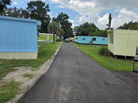 Photo of 10446 County Road 44, Leesburg, FL 34788 (MLS # O6384624)