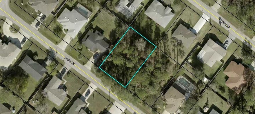 Centrally located lot in Palm Coast close to City of Palm Coast Town Center, schools, medical and dining. Only 7.9 miles to Flagler Beach.Quick access to I-95 for an easy commute North to Saint Augustine or South to Daytona Beach.