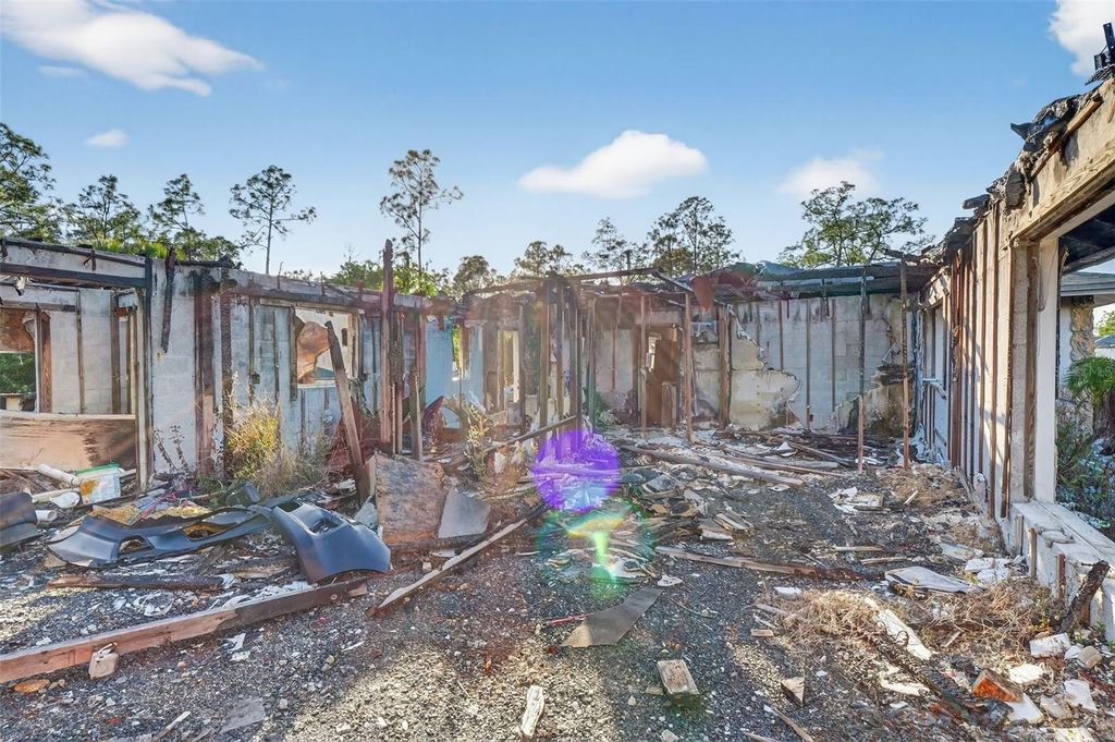 Photo of 2706 E 15th Street, Lehigh Acres, FL 33972 (MLS # O6375340)