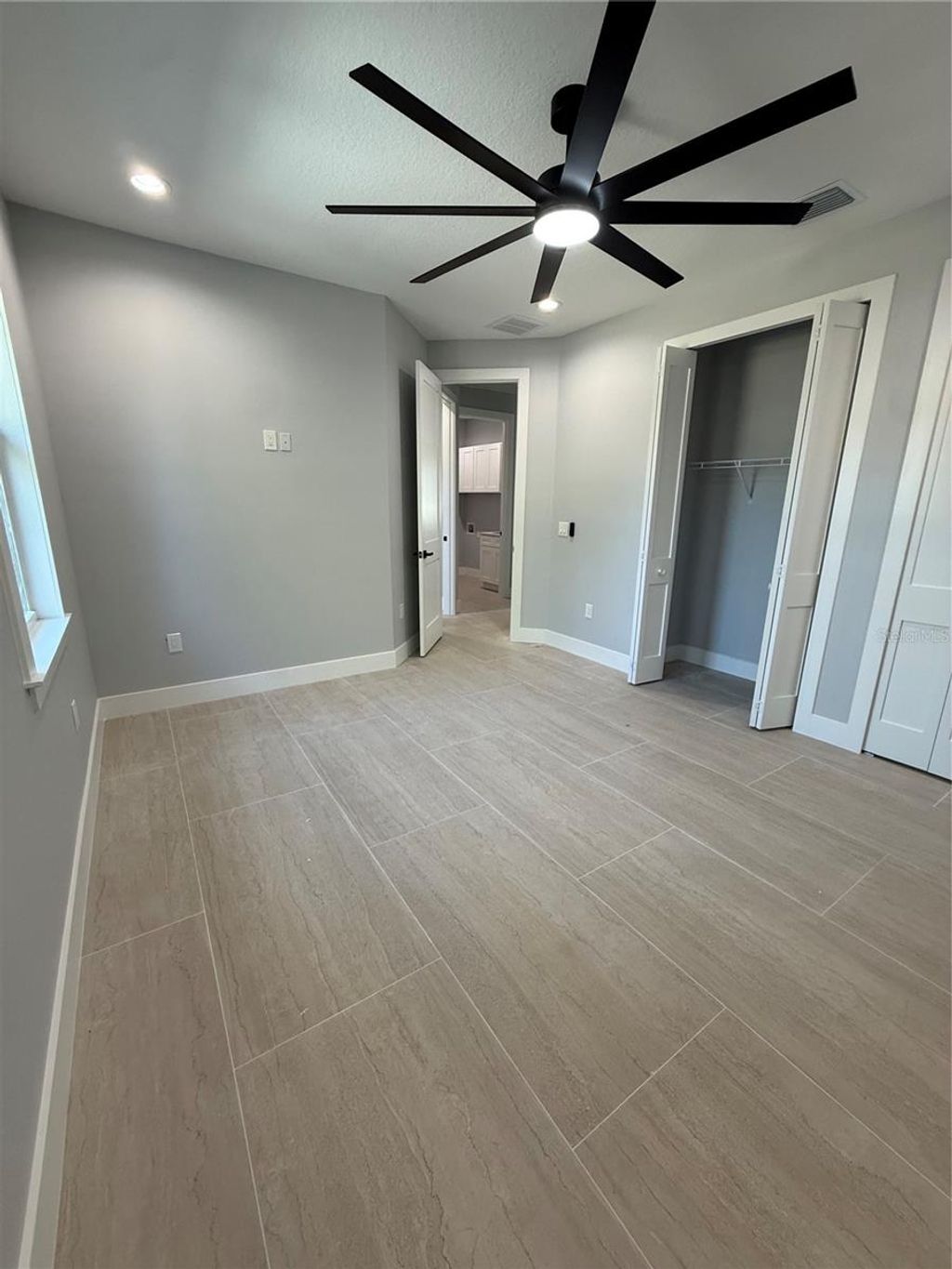 Photo of 7006 Thatcher Avenue #307, Tampa, FL 33614 (MLS # TB8468471)