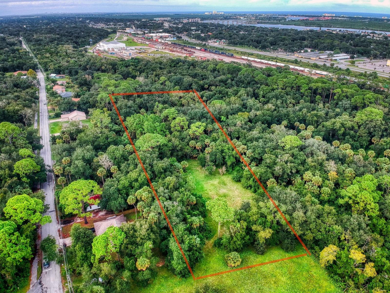 Build your Dream Home near downtown NSB. 2.11 acres just off S. Myrtle Avenue. This property is situated at the corner of W 7th Street and runs behind the homes at the east corner of Myrtle and 7th Street. Numerous Possibilities Await the new owner of this rare find! This is just over 2 acres within a mile and a half from the river. Tucked behind the homes along S. Myrtle Avenue this property offers privacy and the convenience of an excellent location! Come take a look today!; Cleared: No
