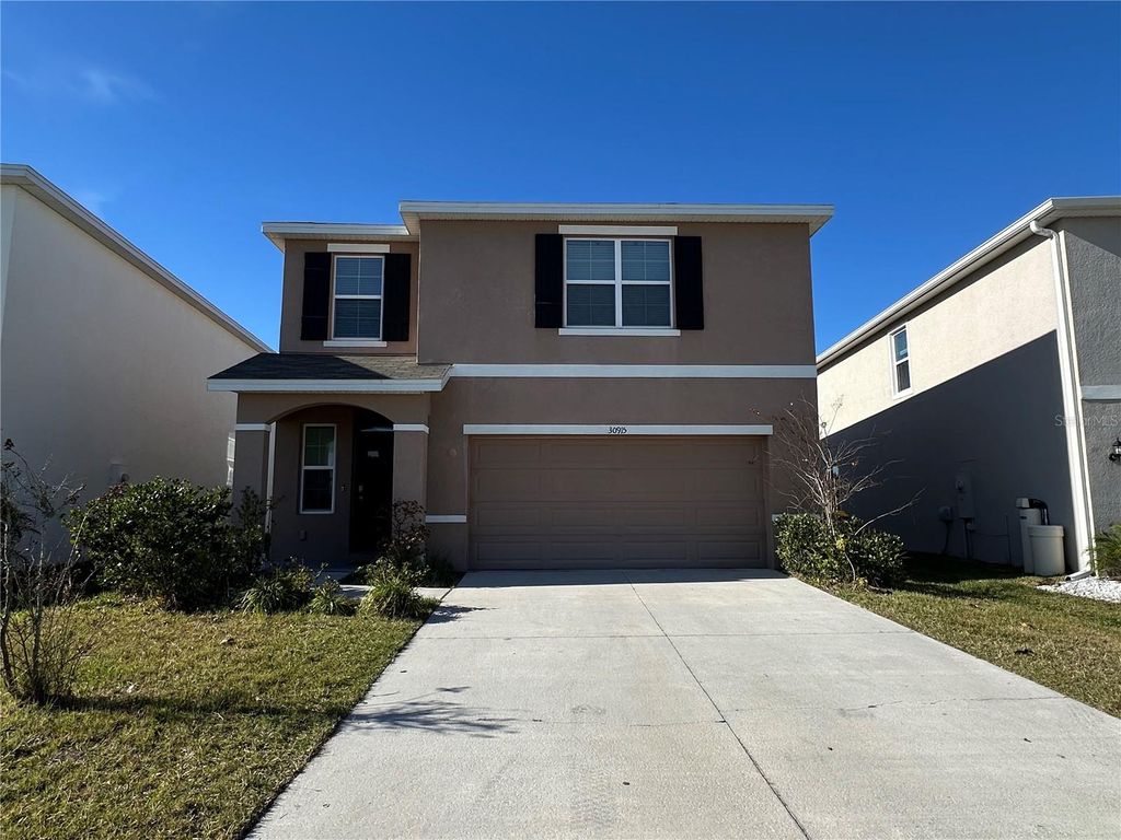 Photo of 30915 Penny Surf Loop, Wesley Chapel, FL 33545 (MLS # O6380643)