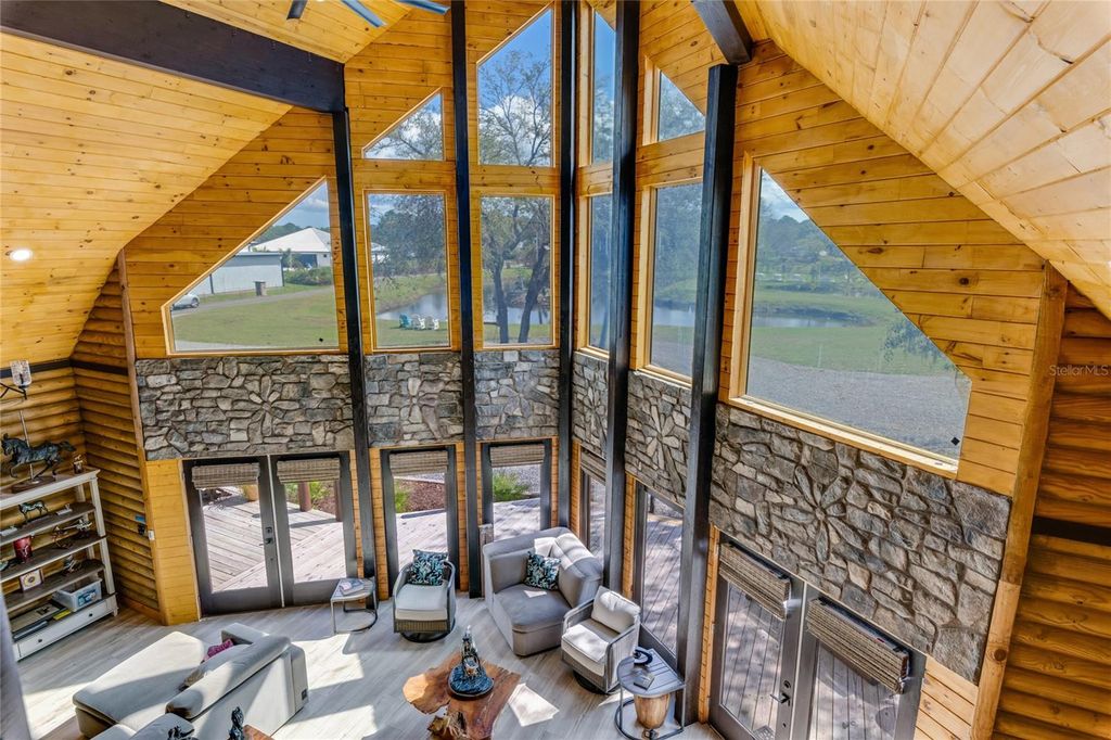 Photo of 1100 Tallacoe Trail, New Smyrna Beach, FL 32168 (MLS # V4947262)