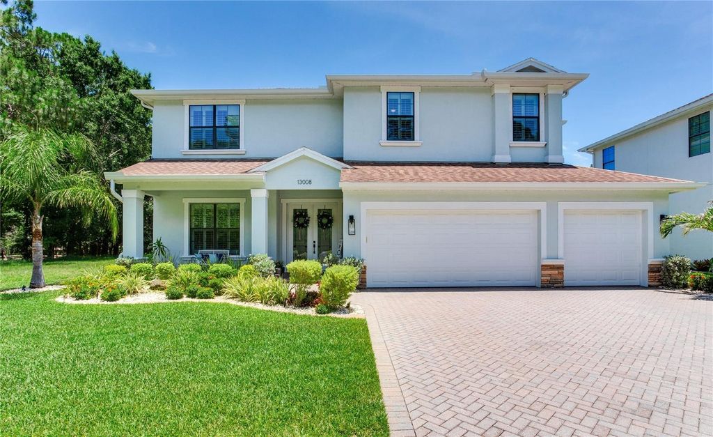 Photo of 13008 Eagles Entry Drive, Odessa, FL 33556 (MLS # TB8368057)