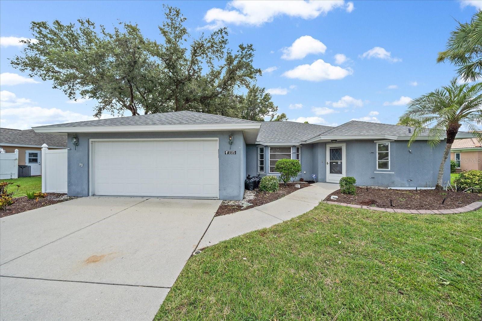 **Brand new pool cage and roof for your piece of mind!** Come see this one before it's gone! Welcome to 3335 Meadow Run Terrace, a spacious 3-bedroom, 2-bathroom pool home located in the established Meadow Run at Jacaranda community in Venice, Florida. This single-family residence offers over 1,860 square feet of living space and sits on a well-maintained lot surrounded by mature landscaping.Inside, you’ll find a bright and open layout with tile flooring throughout the main living areas. The living room features recessed lighting and large windows with plantation shutters, offering excellent natural light and views of the front yard. The kitchen includes granite countertops, solid wood cabinetry, a large central island with bar seating, and a full suite of appliances including a built-in oven, microwave, and dishwasher.The primary bedroom offers an expansive retreat with a walk-in closet and en-suite bathroom complete with dual sinks and a walk-in shower. Two additional bedrooms and a full bathroom are located on the opposite side of the home, providing privacy and flexibility for guests or family.Glass sliders open from the living area to a covered patio overlooking the private pool and backyard. The outdoor space includes both a screened lanai and an open-air deck, ideal for entertaining or relaxing by the water.Residents of Meadow Run enjoy access to community amenities that include a clubhouse, swimming pool, fitness center, tennis courts, and social events, all for a low quarterly HOA fee. The community is located just minutes from shopping, dining, medical centers, and Gulf beaches, with convenient access to I-75.If you're looking for a well-maintained home in a friendly community with great proximity to Venice's best amenities, this property is worth a closer look.