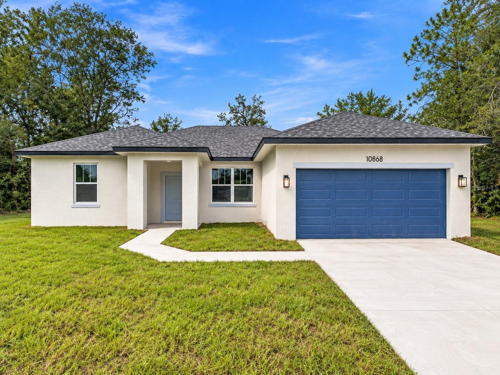 Photo of 10868 N Academy Drive, Citrus Springs, FL 34434 (MLS # O6444464)