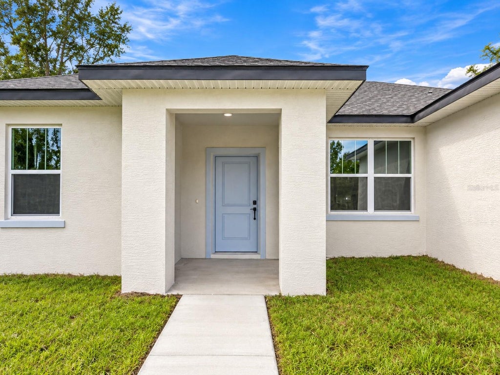 Photo of 10868 N Academy Drive, Citrus Springs, FL 34434 (MLS # O6444464)