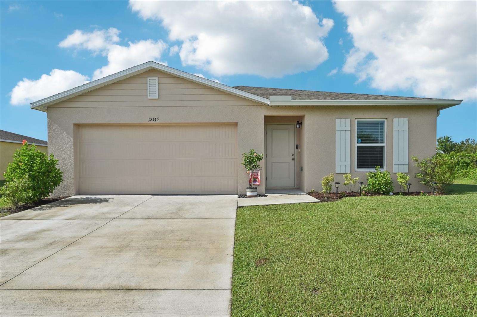 Better than new! This 2023 built 3 BR & Den, 2 BA, 2-car garage home offers privacy and a contemporary open layout. Step into this beautiful home and you will be greeted by lots of natural light and a layout that is perfect for relaxing and entertaining. Your kitchen features sleek stainless steel appliances, white cabinetry, granite countertops, a closet pantry and an inviting breakfast bar that separates the kitchen from the spacious Great Room. The Primary Bedroom Suite provides a private retreat, complete with a walk-in closet and a stylish en-suite bathroom with double vanity and granite countertop. Two guest bedrooms, a guest bath with shower over tub and a generously sized Den/Office complement the split layout, which is perfect when family or friends come to visit. Additional highlights include a laundry closet with side-by-side washer & dryer and an attached two-car garage. Step through the sliding glass doors to your backyard, ready for your touches, like your own oasis with a pool or extended lanai. Plenty of room to get creative! There is a water softening system to optimize your well water (no water/sewer bills here!). You will love the location, which is in close proximity to schools, parks, restaurants, shopping and the gorgeous Gulf beaches. No HOA! No CDD! Schedule your private showing today!