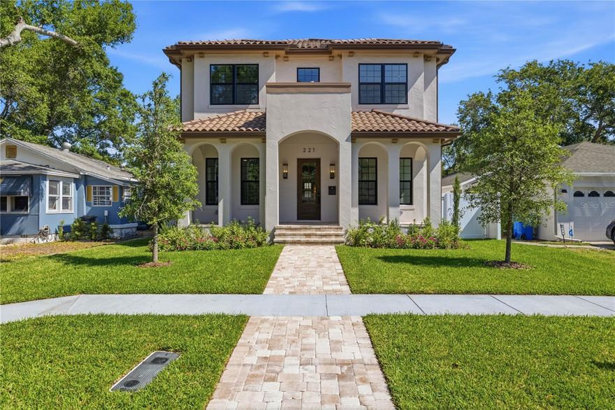 Welcome to Villa L’Arco Dorato — a modern Mediterranean retreat crafted by Bay to Bay Group in the heart of St. Petersburg. Imagined as a modern-day Italian villa, this Golden Arch residence evokes the romance of Northern Italy with sun-warmed stucco, graceful arches, and timeless artistry that transports you to the Mediterranean coast. Step inside to soaring ceilings, abundant natural light, and a seamless flow between the living room, dining area, and chef’s kitchen. Featuring stone countertops, Z-LINE appliances, and a walk-in butlers pantry, the kitchen is designed for everything from quiet mornings to unforgettable gatherings. Downstairs you will find a guest bedroom with its own en-suite bath and upstairs you will find the primary suite which offers a private sanctuary with a spa-inspired bath, soaking tub, and custom finishes. Three additional bedrooms and beautifully appointed baths provide comfort for family and guests. A detached two-car garage compliments the property, offering both convenience and additional storage. Mediterranean stucco, curated landscaping, and architectural elegance carry the home’s character inside and out, making everyday life feel like a Tuscan getaway. Schedule your private tour today and experience Villa L’Arco Dorato for yourself. Close proximity to all that St Pete has to offer.