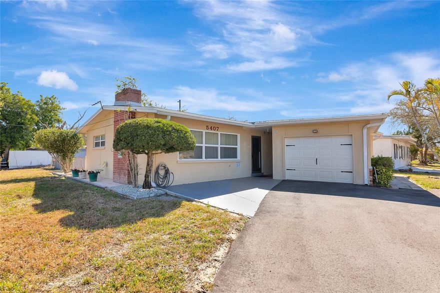 You’ve seen the rest...Now see the Best! This adorable and affordable 2-bedroom, 2 bath home has 1196 sq/ft and is Move in Ready. As you pull up, you will notice the house is situated on a large, corner lot and there's plenty of room to park on the spacious, circular driveway and 1 car garage. Entering the home, the flooring is all tile and laminate for easy care, and it will become obvious that Mr. and Mrs. Clean live here! This house is a snowbird's winter retreat that was lightly used and lovingly maintained over the years. Be sure to take the 3D tour and virtually walk through the house. The living room has a wood burning fireplace; the kitchen has newer wood cabinets; and all the furnishings and appliances are included, so there's nothing to do but move right in! The electric panel was updated in 2023, the AC was replaced in 2022, and the roof was done in 2012. The yard is fenced and there are no HOA or CDD fees. The house is flood zone X, so no flood insurance is required. There is also a storage shed in the backyard. The flower beds are growing Prickly Pears and Papaya and if you want a garden, there is plenty of room in the backyard. This is a perfect starter home, second home, or investment property in a convenient area, with easy access to SR70, US 41, restaurants, shopping, Bradenton area beaches and all area amenities.  Easy to show!