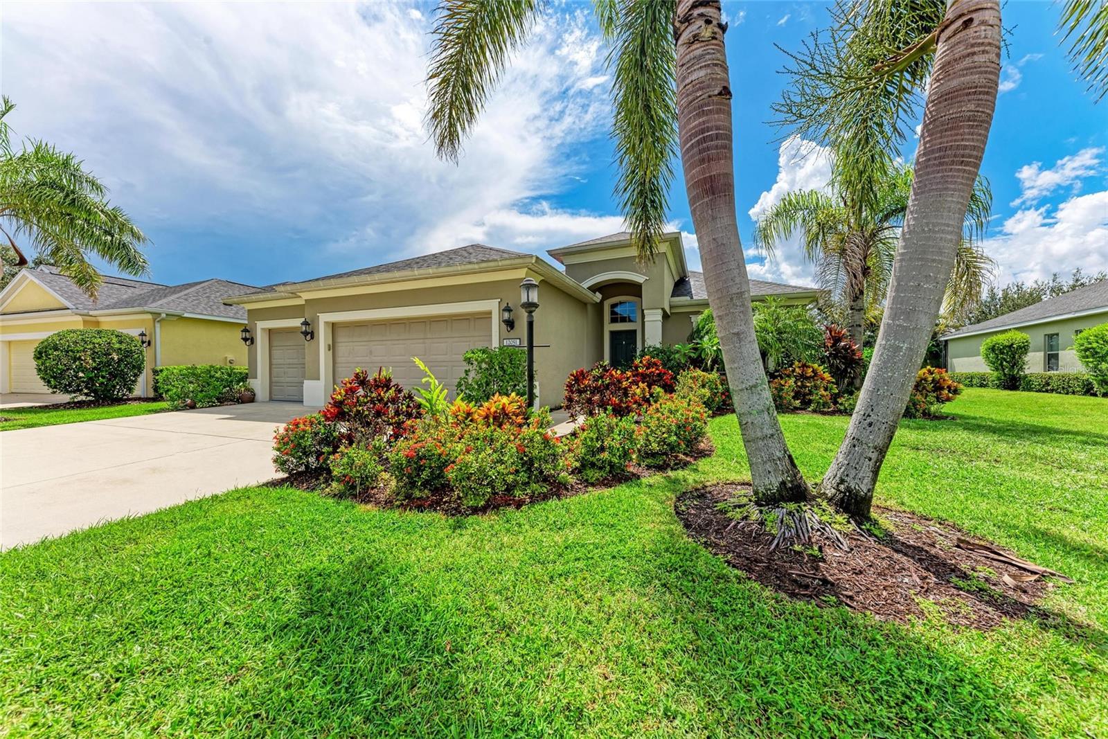 This beautifully maintained two-story residence offers over 3,100 sq ft of well-designed living space on a 1/3-acre lakefront lot, perfectly positioned to capture breathtaking sunrises and sunsets. Featuring 5 spacious bedrooms—including 4 on the main level—and 4 full bathrooms (two with walk-in showers and two with soaking tubs), this home blends comfort, elegance, and functionality.
The open-concept kitchen, dining, and family room is the heart of the home, boasting granite counters, a center island, walk-in pantry, and brand new stainless steel appliances. Recent upgrades include luxury vinyl flooring, plush carpeting, and a brand new roof with solar panels for energy savings.
Step outside to your private outdoor oasis, complete with a spa, oversized swimming pool, and panoramic screened lanai plumbed for a future outdoor kitchen—ideal for entertaining or simply relaxing by the water.
Upstairs, a large bonus room with full bath and walk-in closet offers the perfect space for a guest suite, home office, or in-law accommodations. Additional highlights include a 3-car garage with a Tesla charging station, central vacuum, surround sound, and a two-zone A/C system for efficiency and comfort. X flood zone, safest in the area, and we’re on the same power grid as the school, which is also a shelter so we never lose power.
Located in the highly sought-after Central Park community, you’ll enjoy resort-style amenities including tennis and pickleball courts, a splash pad, playgrounds, and scenic walking trails. This home is zoned for top-rated schools—Mona Jain, Lakewood Ranch High, and Gullett—all within walking or biking distance. Just minutes from shopping, dining, golf, and recreation.
This lakefront gem is move-in ready and offers the perfect blend of luxury and lifestyle in one of Lakewood Ranch’s most desirable neighborhoods.