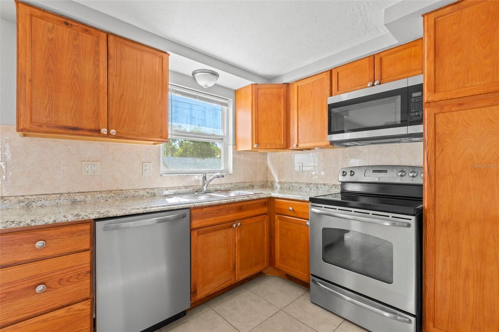 Photo of 1508 Derrick Street, Holiday, FL 34690 (MLS # TB8541319)