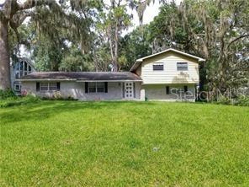 Photo of 8301 N River Oaks Court, Tampa, FL 33617 (MLS # TB8457888)