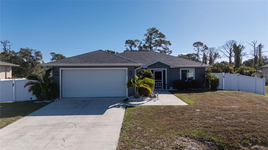 Welcome to this beautiful well-maintained 3-bedroom, 2-bath home located in a quiet neighborhood in growing North Port. This split-bedroom open floor plan offers vaulted ceilings, tile and laminate flooring, and a spacious living area perfect for entertaining. The kitchen features custom cabinetry, a breakfast bar, and views of the fenced in serene backyard. The primary suite includes a walk-in closet and en-suite bath. The home was updated in 2023 with a new roof, vinyl fence, paver patio, new flooring, whole house reverse osmosis water system, and many more updates.  The home also has ring cameras at the front and rear of the home. Enjoy Florida living on a generous 0.23-acre lot with plenty of room for a pool or garden. No HOA or CDD. Conveniently located near I-75, shopping, dining, and Gulf Coast beaches. Move-in ready and full of potential—schedule your showing today!