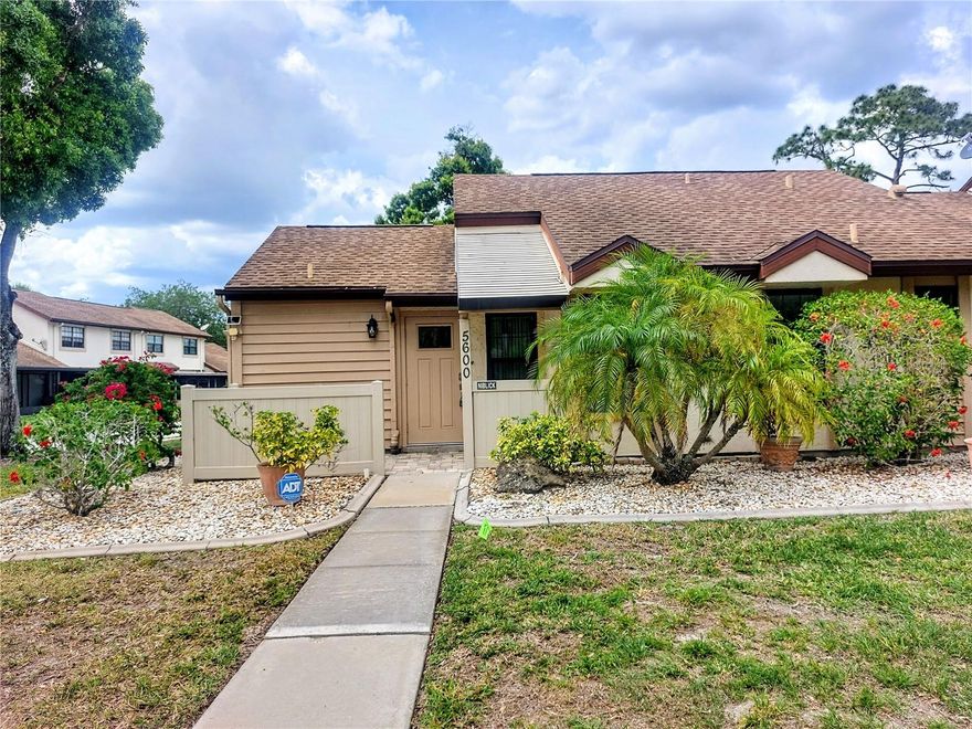 WELCOME HOME to your Beautifully Maintained 2 BR 2 BA end unit Villa located in one of the most desirable and affordable communities you will find anywhere! From the moment you walk inside, you will be greeted with a Spacious Open Concept floor plan; high Cathedral ceilings in the Living Room/Dining Room areas that offers the perfect blend of comfort, convenience and true Florida living. Featuring a SPLIT FLOOR PLAN for enhanced privacy - ideal for families, guests or a home office - the layout is both stylish and functional. CITY WATER & SEWER, HI-IMPACT WINDOWS/DOORS! NO CDD! Exterior Vinyl FENCING & more! The Updated, Custom Kitchen features newer, Stainless Steel Appliances, QUARTZ COUNTERTOPS with a Pass Through & Breakfast Bar area. The Kitchen also connects to a separate Laundry Room with Extra Storage & a new HOT WATER HEATER, meeting all of your practical needs. The roomy Primary Bedroom also has a large Wall Unit for extra storage space and offers an En-suite Bathroom with updated Vanity and Walk-in Shower-- the Guest Bedroom has Pull-down Stairs to the Attic with additional STORAGE space and features a Jack 'n Jill Bathroom with an updated Vanity and a Combo Tub/Shower. Newer A/C & ELECTRICAL PANEL, tile floors throughout the living areas including the Lanai. Step through the HI-IMPACT sliding doors from the Dining Room on to the large, Screened-in/Wrap-around Lanai with sliding Vinyl Windows and the perfect spot to enjoy your morning coffee or entertain friends in the evening for Cocktails! The LOW-MAINTENANCE LIFESTYLE in this HOA includes Roof Maintenance, Lawn care & Irrigation System, Exterior upkeep and a Sentricon, in-ground Termite system for peace of mind. This charming Villa is perfectly located and just WALKING DISTANCE TO SHOPPING CENTERS, PUBLIC TRANSPORTATION, Restaurants, Gyms, Schools, Medical facilities and more. Enjoy a SHORT DRIVE TO FAMOUS WARM MINERAL SPRINGS SPA, WELLEN PARK with the ATLANTA BRAVES Spring Training Stadium, NORTH PORT AQUATIC CENTER WATER PARK with Slides, Lazy River & Olympic size, heated Pool, HISTORIC VENICE, PUNTA GORDA, Theaters & Mall as well as top-rated GOLF COURSES and just minutes to I-75 and US Hwy 41 (Tamiami Trail) which makes commuting a breeze. Whether you're looking for a full-time residence or seasonal retreat, this Lovely Villa checks all the boxes. SHOW TODAY and don't miss this chance to have your own slice of Florida's Paradise!!