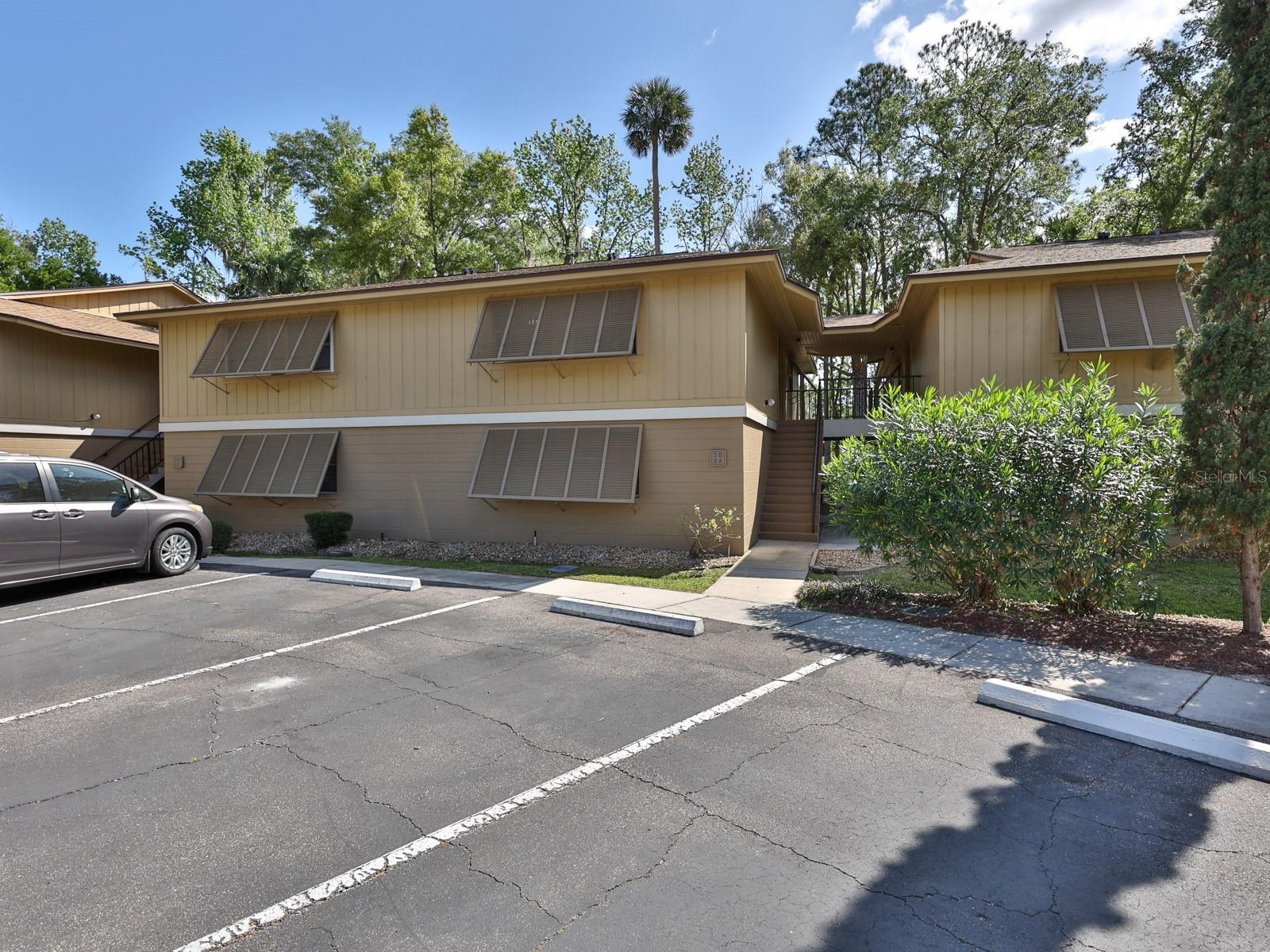 Motivated seller! Don't miss out on this opportunity to enjoy Florida living at its finest in this move-in ready, low-maintenance 2-bedroom, 2-bathroom condo overlooking beautiful Lake Monroe. Located in the Lakeside Condominiums, this 2nd floor unit offers a stunning view of the pool from its private screened lanai. It features a bright open floor plan and inside laundry with stackable washer and dryer. Two sets of sliding doors open to the lanai that runs the length of the unit. The Master bedroom has its own private bath. An assigned parking space is conveniently located a few steps away from the unit, with a covered entry and nighttime security. The community boasts two solar-heated saltwater pools, tennis courts, scenic trails for walking and biking, pickle ball and shuffleboard courts. You can enjoy boating, skiing, and all sorts of water fun on Lake Monroe, located just minutes away via the St. Johns River boat ramp. You're also walking distance to shopping, grocery stores, dining, and Thornby Park. Plus, it's easy to access I-4 and the DeBary Sunrail Station. No pets allowed. This is a must-see property - act now before it's gone!