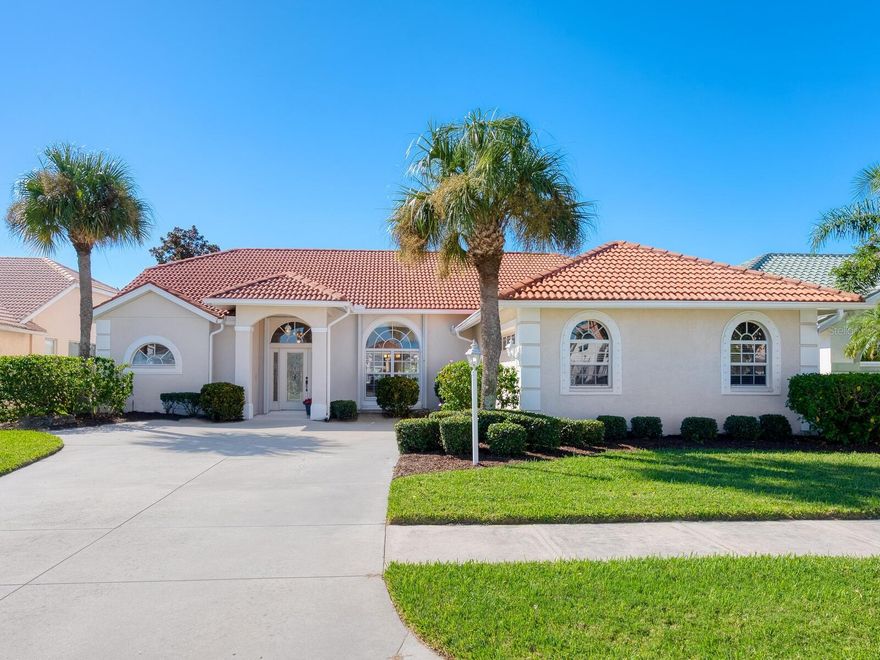 Enjoy sparkling lake views from this spacious 3-bedroom home in the desirable Hidden Lakes Club! This open split-floor plan features vaulted ceilings, skylights, large windows, and pocket sliders that fill the home with natural light. Relax on the expansive lanai or in the heated pool overlooking the lake and fountain. For peace of mind, storm protection includes clear panels, accordion shutters, and a remote-controlled roll-down screen for the lanai. The primary suite offers a luxurious retreat with a sitting alcove and lake views, soaking tub and large shower, private water closet, and dual vanities with a make-up area. Guests will love the two bedrooms and bathroom, which opens directly to the pool area. Additional highlights include abundant closet space, an oversized laundry room with sink, and a large 2-car garage with separate storage room. Hidden Lakes Club residents enjoy a clubhouse with kitchen, library, billiards, and work out area. Outdoor amenities include community pool and spa, and courts for tennis, pickleball, basketball, shuffleboard, and bocce. Conveniently located near shopping, restaurants, I-75, and just minutes to charming and historic downtown Venice and its pristine Gulf beaches.