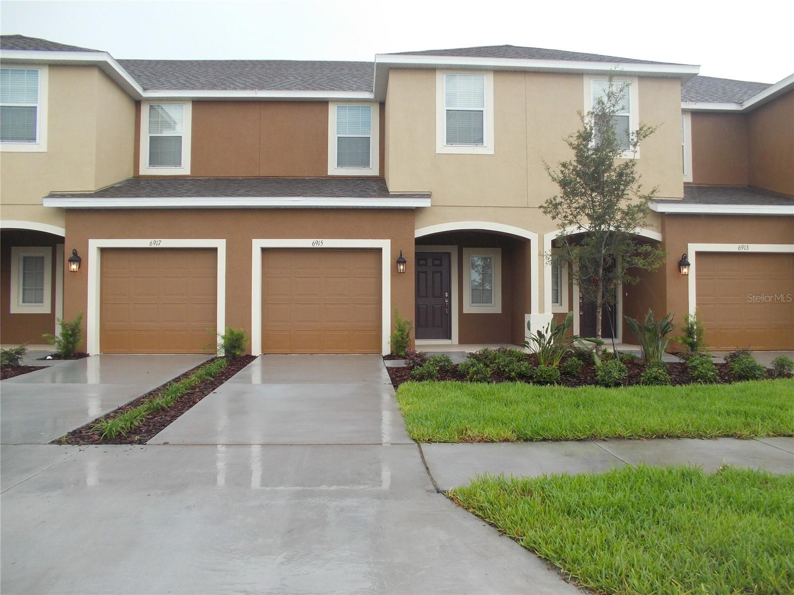 Water included! Townhome with all the bells and whistles! Located across from guest parking area, mailboxes and a block from the community pool. Freshly painted interior. Granite counter tops in the kitchen with extended island/bar and stainless appliances. Tile throughout the first floor and in all wet areas. There is a 1/2 bath located on the first floor. Nice size one car garage with an epoxy finished floor. Washer and dryer upstairs. The home backs up to conservation area! Upstairs is a full size washer/dryer. Master bedroom suite has a walk in closet, walk-in shower and double vanities. At time of move-in, tenant costs will include a processing fee of $125.00 along with rent and any deposit.