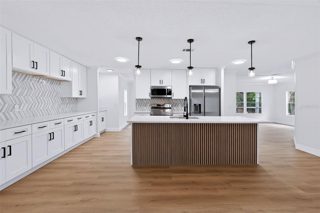 Photo of 14100 Little Ranch Road, Spring Hill, FL 34610 (MLS # TB8553598)