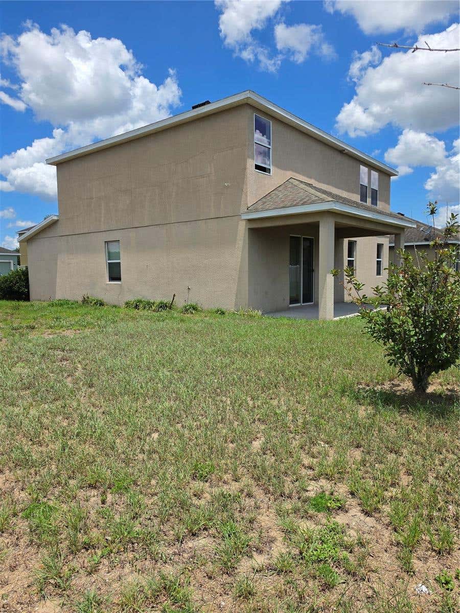 Photo of 100 Highland Meadows Street, Davenport, FL 33837 (MLS # G5114054)