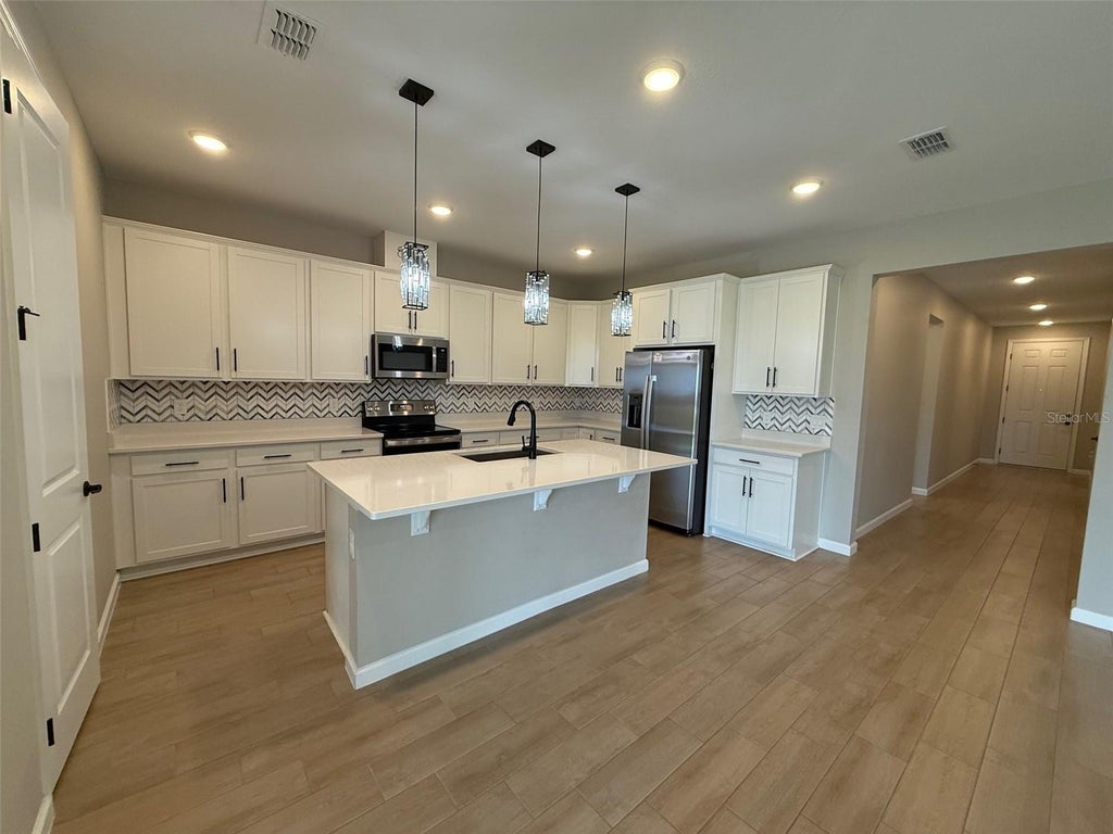 Photo of 10073 Spring Lake Drive, Clermont, FL 34711 (MLS # O6423343)
