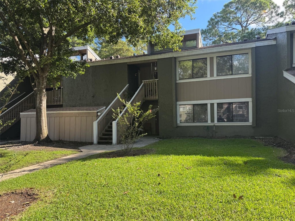 Photo of 5885 Windhover Drive #4E, Orlando, FL 32819 (MLS # O6444576)