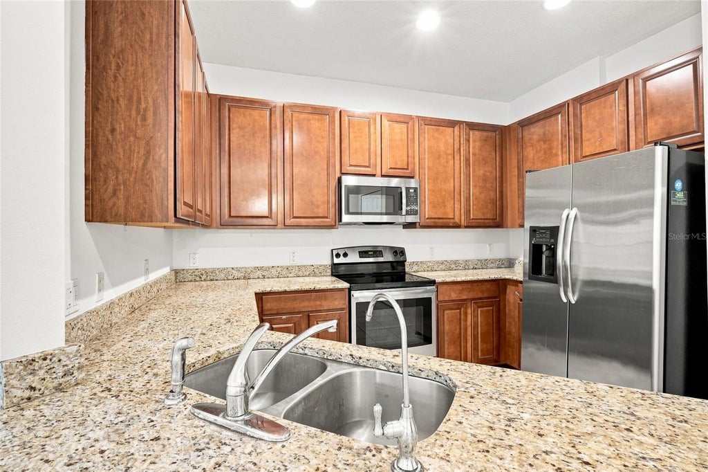 Photo of 13613 Eridanus Drive, Orlando, FL 32828 (MLS # O6437453)