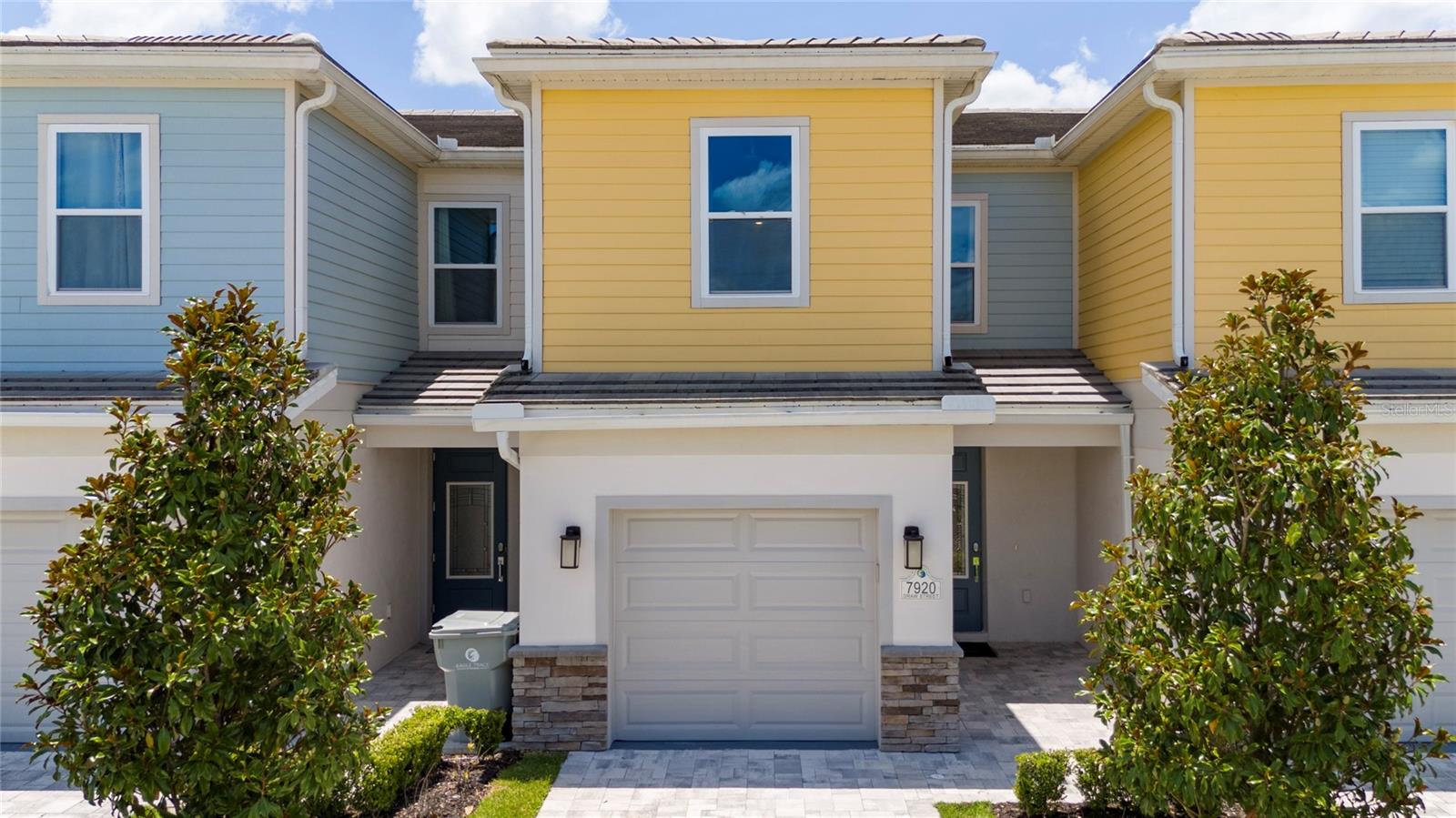 Welcome to your dream home in the one-of-a-kind Reunion Resort Community, minutes from the magical world of Disney! This stunning property, built in 2021, comes fully furnished and boasts an open-concept design with 3 spacious bedrooms and 2 modern bathrooms. This home features elegant quartz countertops and a delightful back porch that seamlessly connects to your private backyard oasis, complete with a sparkling pool. The only personal touch needed is to open up the back porch and step right into your outdoor paradise! Reunion Resort is a premier golf community featuring 3 award-winning golf courses (Palmer, Watson & Nicklaus). The community offers unparalleled amenities, including fully transferable golf membership, an exciting water park with waterslides, lazy rivers, mini golf, 6 tennis courts, pickleball courts, playgrounds, and bike and golf cart rentals. Enjoy on-site dining options and the convenience of being just three minutes away from Walt Disney World. Experience a lifestyle of luxury and leisure in this vibrant community. Don’t miss your chance to make this beautiful home yours!