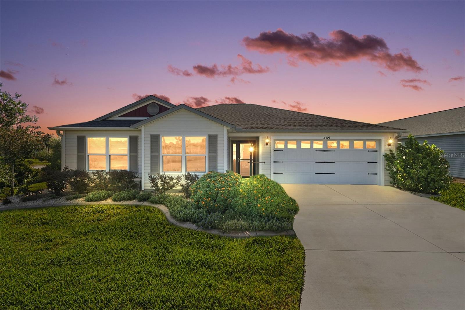 IMMACULATE 3/2 TURNKEY Anchor on SPACIOUS CORNER LOT with PRIVACY LANDSCAPING in the highly sought-after Village of St. Catherine! ONLY 4 years old! JUST A SHORT WALK to SAWGRASS GROVE and A GOLF CART RIDE to the upcoming EASTPORT TOWN SQUARE! This FABULOUS TURNKEY home is MOVE-IN READY offering EVERYTHING YOU NEED for EFFORTLESS LIVING FROM DAY ONE! A generously sized CORNER LOT with elegantly curbed landscaping beds and a COVERED ENTRY welcome you into this BEAUTIFULLY MAINTAINED home! Step inside, to the BRIGHT SPACIOUS layout with HIGH VAULTED ceilings and GORGEOUS luxury vinyl plank flooring throughout the main areas. The OPEN-CONCEPT living, dining, and kitchen create a seamless main living space, ideal for both relaxing and hosting guests. The EXPANSIVE kitchen is a chef’s dream, featuring crisp WHITE SHAKER cabinetry, ELEGANT countertops, STAINLESS steel appliances, GAS range, PANTRY closet, and COUNTER-HEIGHT EAT-IN breakfast bar perfect for casual dining. From the living room, sliding glass doors lead you into the PRIVATELY LANDSCAPED LANAI! This WONDERFUL room is a FANTASTIC space for ENTERTAINING friends and family; or simply RELAXING with your morning coffee, evening cocktail, or a good book! The REMOTE POWERED lanai screen adds to the PRIVATE OASIS. There’s even an adjacent rear patio - ideal for grilling and enjoying the beautiful Florida weather! Back inside, retreat to your LUXURIOUS primary suite boasting a GENEROUS WALK-IN closet. It’s en suite bathroom offers WHITE SHAKER cabinetry, DOUBLE vanities, and a TILED WALK-IN shower. A SPLIT FLOOR PLAN, places two additional bedrooms and a second bathroom near the front of the home creating a PRIVATE guest wing or QUIET home office. Bedrooms two and three each offer built-in closets and share a full bathroom with WHITE SHAKER vanity, tub/shower combination, and a hallway LINEN closet. A well-appointed interior laundry room is conveniently located behind a POCKET door between the kitchen and garage and includes WHITE SHAKER cabinetry, utility sink, and a LARGE STORAGE closet. Completing the package is a two-car garage with an additional refrigerator and ample parking and storage space! DON’T MISS YOUR OPPORTUNITY to make this INCREDIBLE TURNKEY HOME YOUR OWN! The Village of St. Catherine is just steps away from Sawgrass Grove and close to both Brownwood Paddock Square the upcoming Eastport Town Square! Conveniently located by five neighborhood pools and recreation centers (Homestead, St. Catherine, Bradford, Aviary, Hawkins); three large regional recreation complexes (Ezell, Everglades & Rohan); Southern Oaks Country Club and Championship Golf Course; Clifton Cove Putting Course; Shopping and Dining at Magnolia Plaza and more! PLEASE WATCH OUR WALKTHROUGH VIDEO of this AMAZING TURNKEY HOME in a FABULOUS LOCATION, and call today to schedule your Private Showing or Virtual Tour!