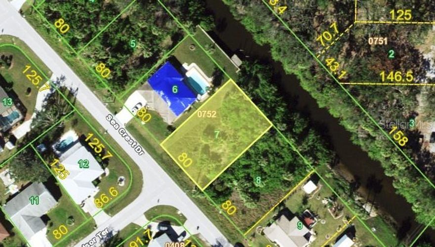 Located in a developing neighborhood, this residential lot features easy access to main roads, utilities nearby, and proximity to local amenities