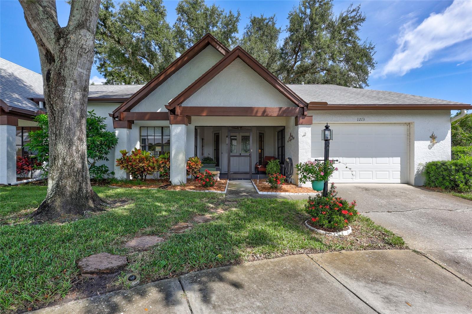 Welcome to this stunning two bedroom, two bath villa nestled in a peaceful cul-de-sac within a vibrant 55+ community. Enjoy the serene conservation area right in your backyard, where you can watch deer and fawns in the morning. The villa has been beautifully updated with a new spacious kitchen with new flooring and large windows that fill the space with natural light. Located in a community that offers two heated pool (one that has pontoon boat access) shuffleboard, a pool room and two great rooms for dinners and dances. pickleball and tennis courts, bocce ball shuffleboard, a pool room and a great room for dinners and dances even 3 executive golf courses that have no additional charge
