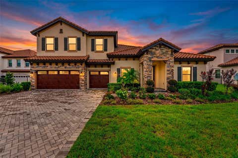 Photo of 10370 Meadowrun Drive, Lithia, FL 33547 (MLS # TB8535209)