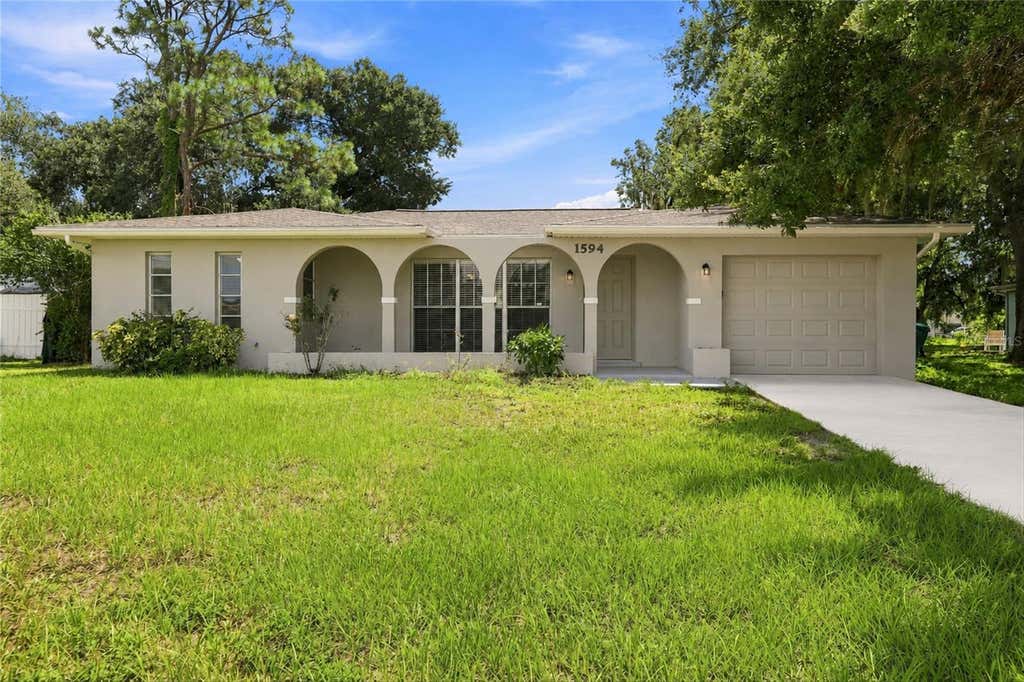 Photo of 1594 Beacon Drive, Port Charlotte, FL 33952 (MLS # C7529098)