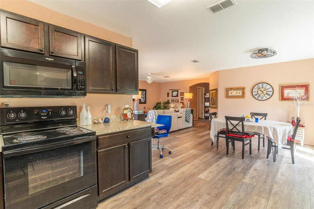 Photo of 414 Miles Boulevard, Dundee, FL 33838 (MLS # L4958341)