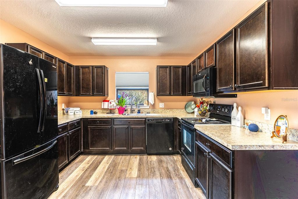 Photo of 414 Miles Boulevard, Dundee, FL 33838 (MLS # L4958341)