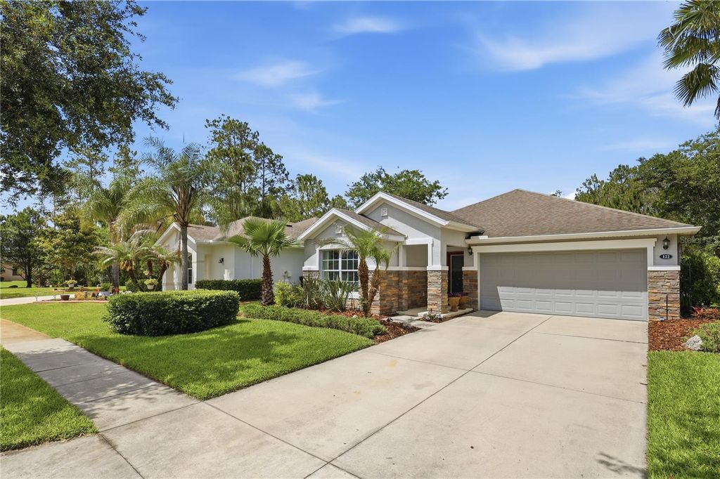 Photo of 122 S Hummingbird Place, Palm Coast, FL 32164 (MLS # FC318665)