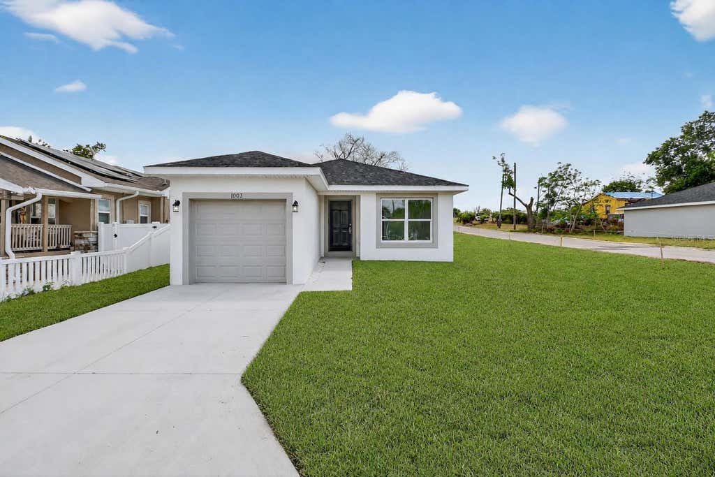 Photo of 1003 Avenue A, Haines City, FL 33844 (MLS # L4964628)