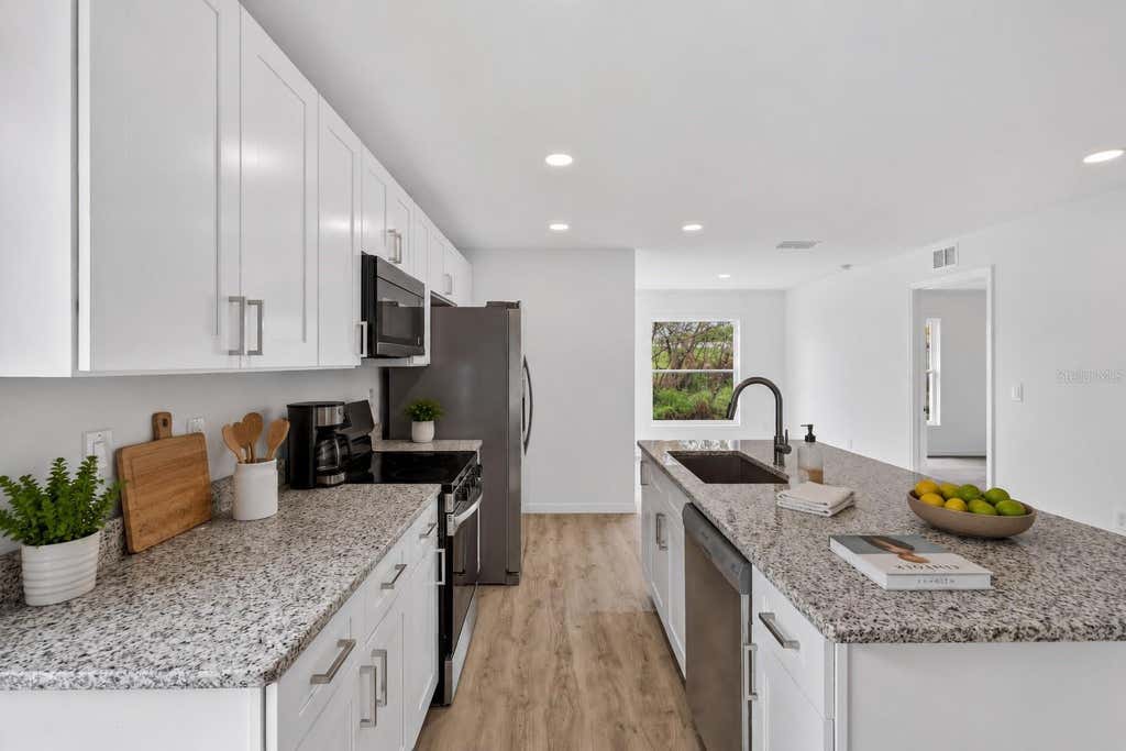 Photo of 1003 Avenue A, Haines City, FL 33844 (MLS # L4964628)
